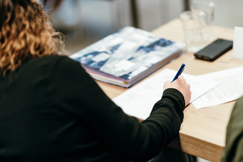 Cursist maakt aantekeningen tijdens FBN cursus